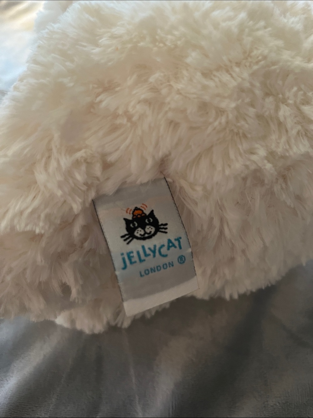 Jellycat Cream Fluffy Plush with Logo Tag - Picture 2 of 3